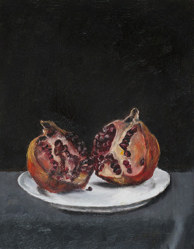 Pomegranate on a White Plate